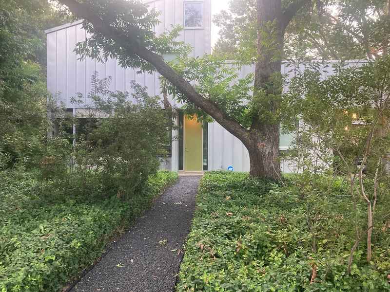 ground covers in front of a home in Dallas