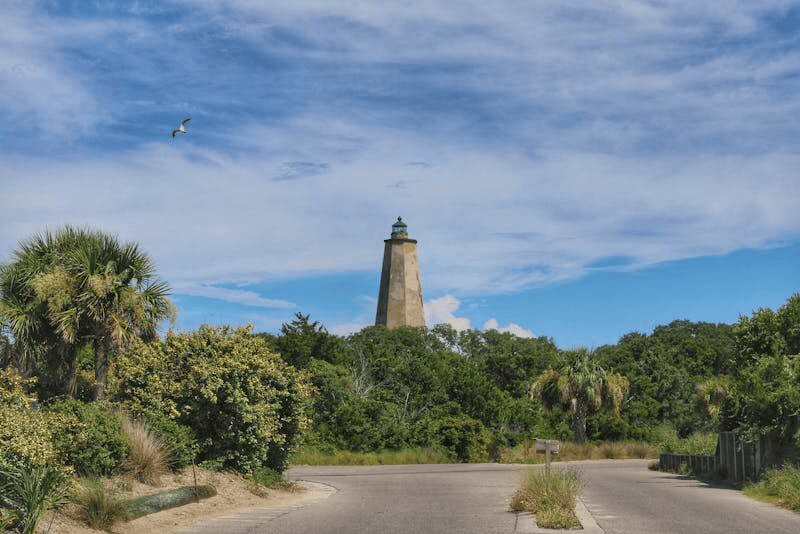Brown lighthouse under blue sky in North Carolina