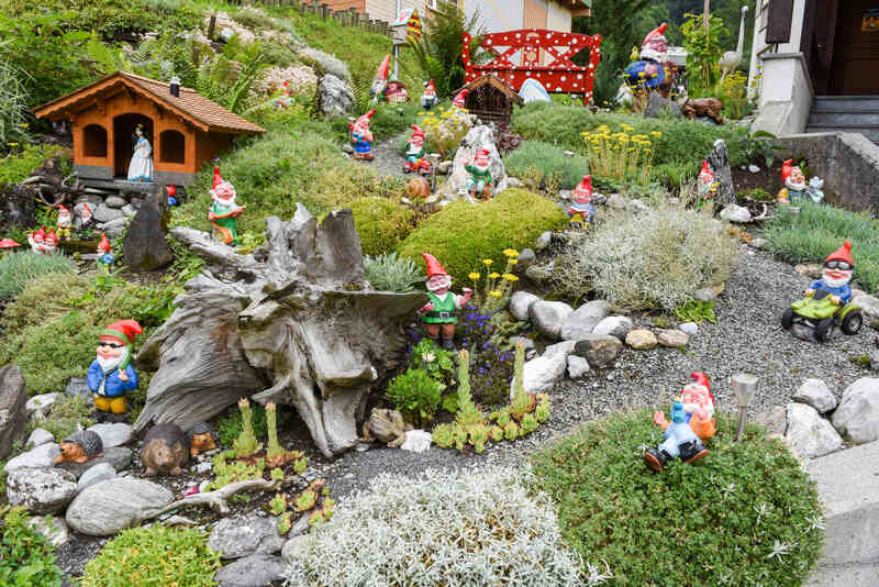 Garden gnomes in a garden of a house at Engelberg