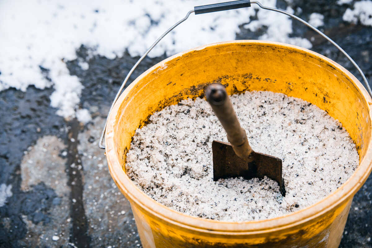 bucket of ice melt, winter salt for roads and sidewalks