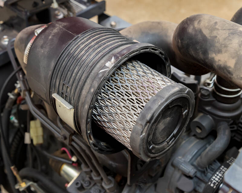Dirty Air filter on diesel lawn mower tractor engine