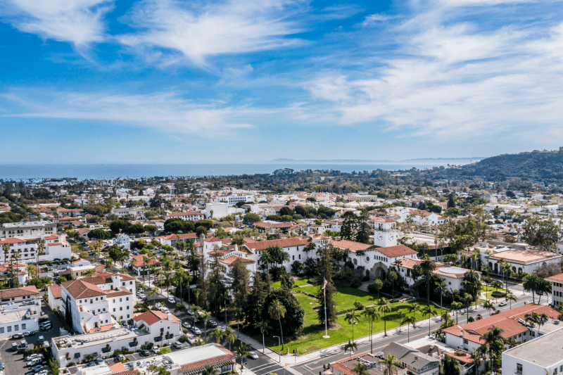 An aerial view of Santa Barbara, California, with the ocean in the distance