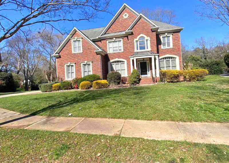 Well-maintained lawn with neatly mowed grass in front of a house in Charlotte, N.C.