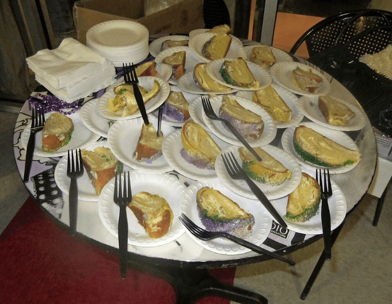 A pile of king cake slices on a serving table in Mississippi