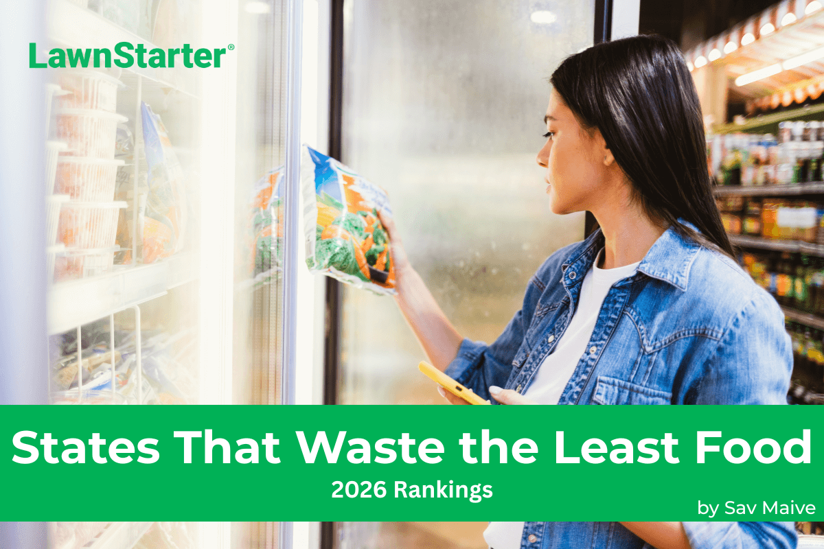 A young woman considers her shopping habits while holding frozen produce at the grocery store