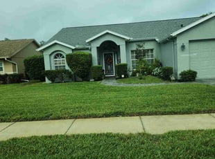 Bush Trimming by Robert Pierson for Paula W. in New Port Richey, FL