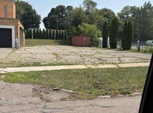 Weeding by Zach Dangler for Adam E. in Lansing, MI