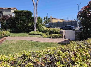 Bush Trimming by Ricardo Garcia for James G. in Long Beach, CA