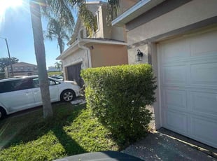 Bush Trimming by Mark Leon for Kristen D. in Davenport, FL