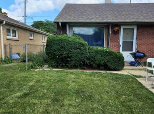Bush Trimming by Ronnie Anderson for Marcus L. in Milwaukee, WI