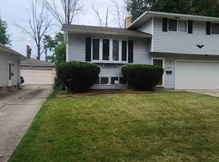 Bush Trimming by Richard Robinson for Jean E. in Maple Heights, OH
