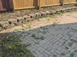Weeding by Jon Becker for Duff Y. in Belleville, IL