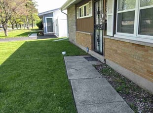 Weeding by Dominique Brittman for Pearl C. in Calumet City, IL