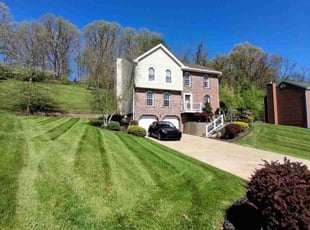 Tia E.'s grass maintenance service result