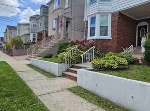Angela C.'s grass maintenance service result