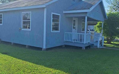 Photo of Liz D.'s yard after getting lawn care in New Iberia, LA
