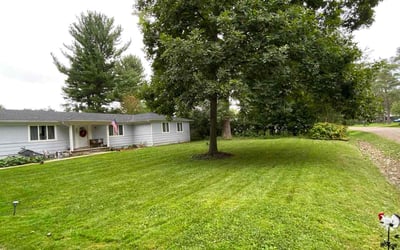 Photo of Andrea N.'s yard after getting lawn care in Holly, MI