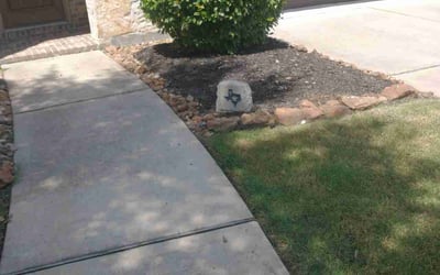 Photo of Rachel M.'s yard after getting landscaping in Bleiblerville, TX