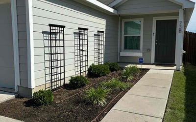 Photo of Megan M.'s yard after getting landscaping in Princeton, TX