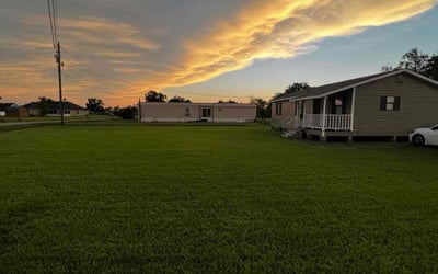 Photo of Lorraine P.'s yard after getting lawn care in Saint Martinville, LA