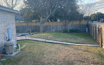 Photo of Angela M.'s yard after getting landscaping in Fentress, TX
