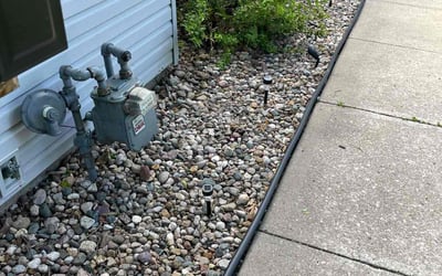 Photo of Elaine M.'s yard after getting landscaping in Dearborn, MO