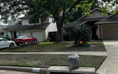 Photo of Carolyn M.'s yard after getting landscaping in Hull, TX