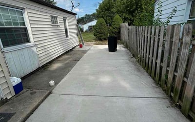 Photo of Emelda D.'s yard after getting tree care in Lake Orion, MI