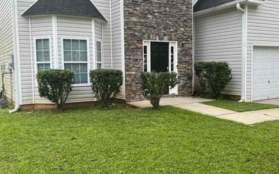 Photo of Natalie B.'s yard after getting landscaping in Powder Springs, GA
