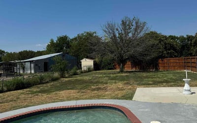 Photo of Elizabeth M.'s yard after getting landscaping in Westminster, TX