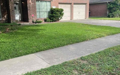 Photo of Becca B.'s yard after getting lawn care in Lees Summit, MO