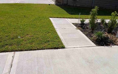 Photo of Charlotte W.'s yard after getting lawn care in Houston, TX