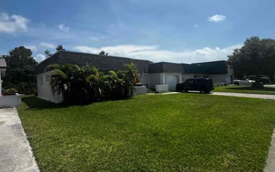 Photo of Natalie H.'s yard after getting lawn care in St. Petersburg, FL