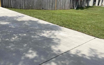 Photo of Ericka A.'s yard after getting lawn care in Hialeah, FL