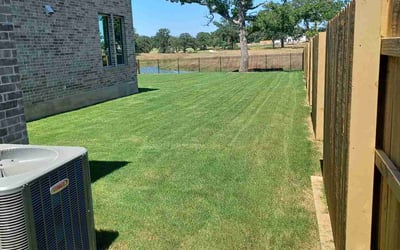 Photo of Barrett Y.'s yard after getting lawn care in Bastrop, TX