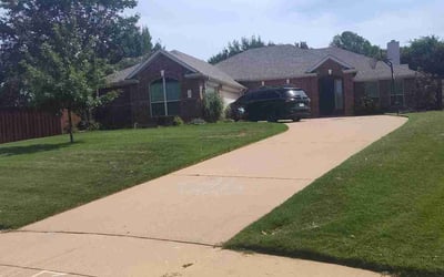 Photo of Michelle L.'s yard after getting lawn care in Montgomery, IL