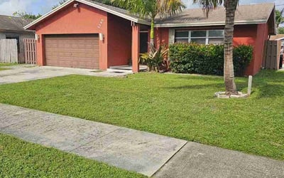 Photo of Marjorie S.'s yard after getting lawn care in Deerfield Beach, FL