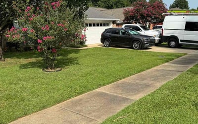 Photo of Leah S.'s yard after getting lawn care in Theodore, AL