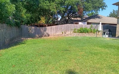 Photo of Brooklynn H.'s yard after getting lawn care in Rockwall, TX