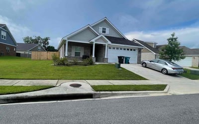 Photo of Jeneile L.'s yard after getting lawn care in Port Arthur, TX