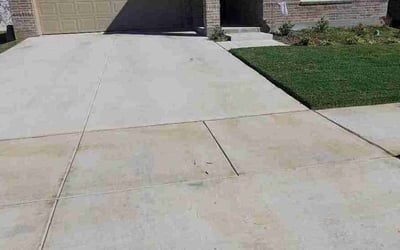 Photo of Addyson B.'s yard after getting lawn care in Denton, TX