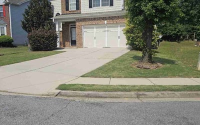 Photo of Diana C.'s yard after getting lawn care in Lilburn, GA