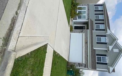 Photo of Tyler J.'s yard after getting lawn care in Lansing, MI