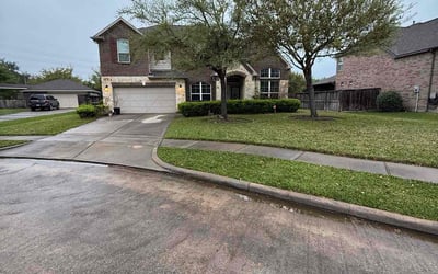 Photo of Alexis K.'s yard after getting lawn care in Katy, TX