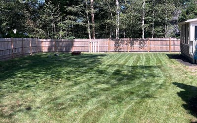 Photo of Joanie W.'s yard after getting lawn care in Rockland, MA