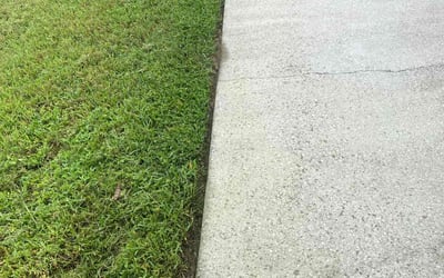 Photo of Meredith R.'s yard after getting lawn care in Alexander, AR