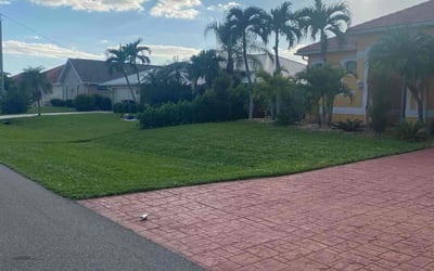 Photo of Carlos G.'s yard after getting lawn care in Cape Coral, FL