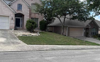 Photo of L C.'s yard after getting lawn care in San Antonio, TX