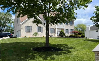 Photo of Sally M.'s yard after getting lawn care in Freehold, NJ