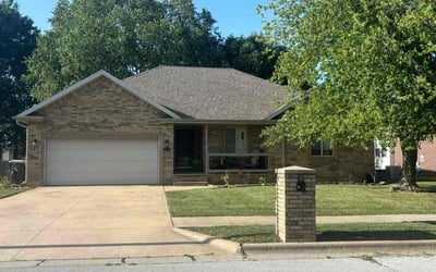 Photo of Leticia S.'s yard after getting lawn care in Springfield, MO